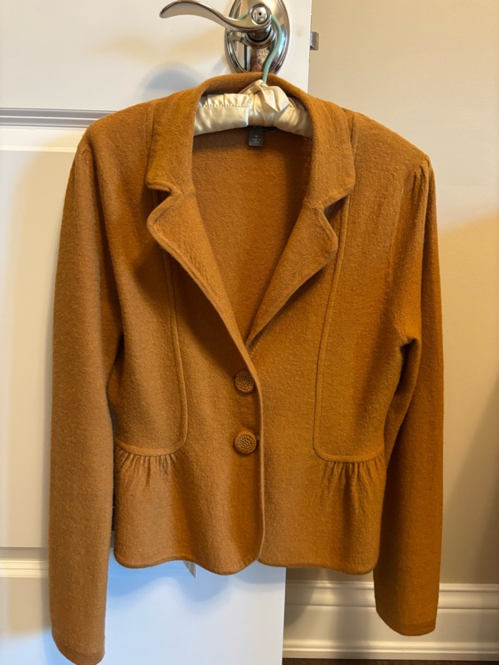 Wool knit jacket with peplum bottom